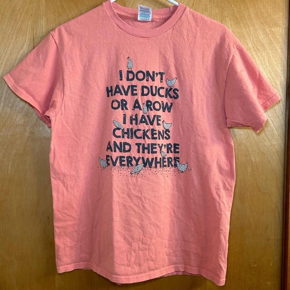 T-shirt size medium I don’t have ducks or a row I have chickens there everywhere